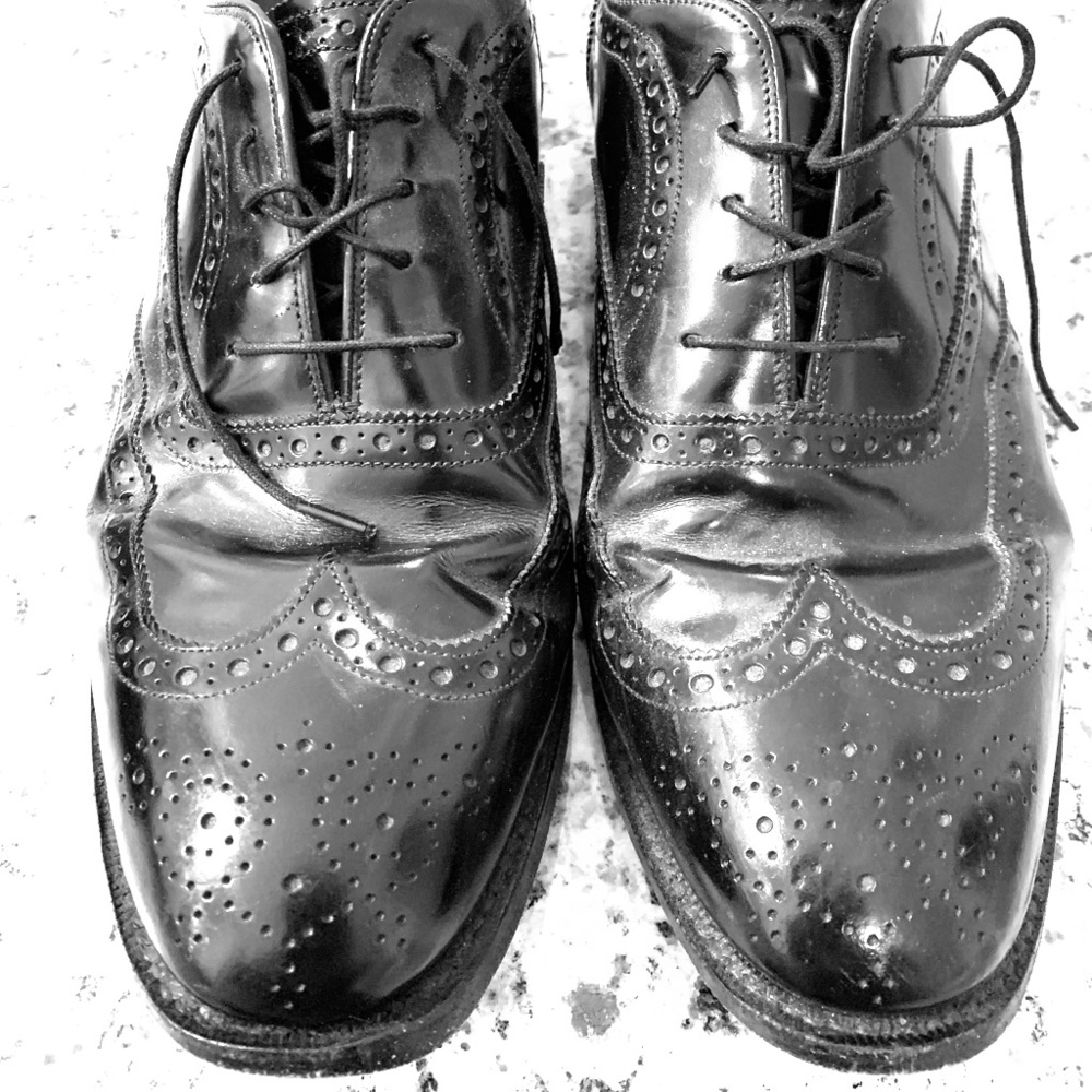 Johnston and Murphy wingtip shoes.